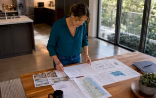 Homeowner reviewing property improvement plans