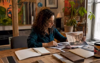 Interior designer reviewing modern millwork examples